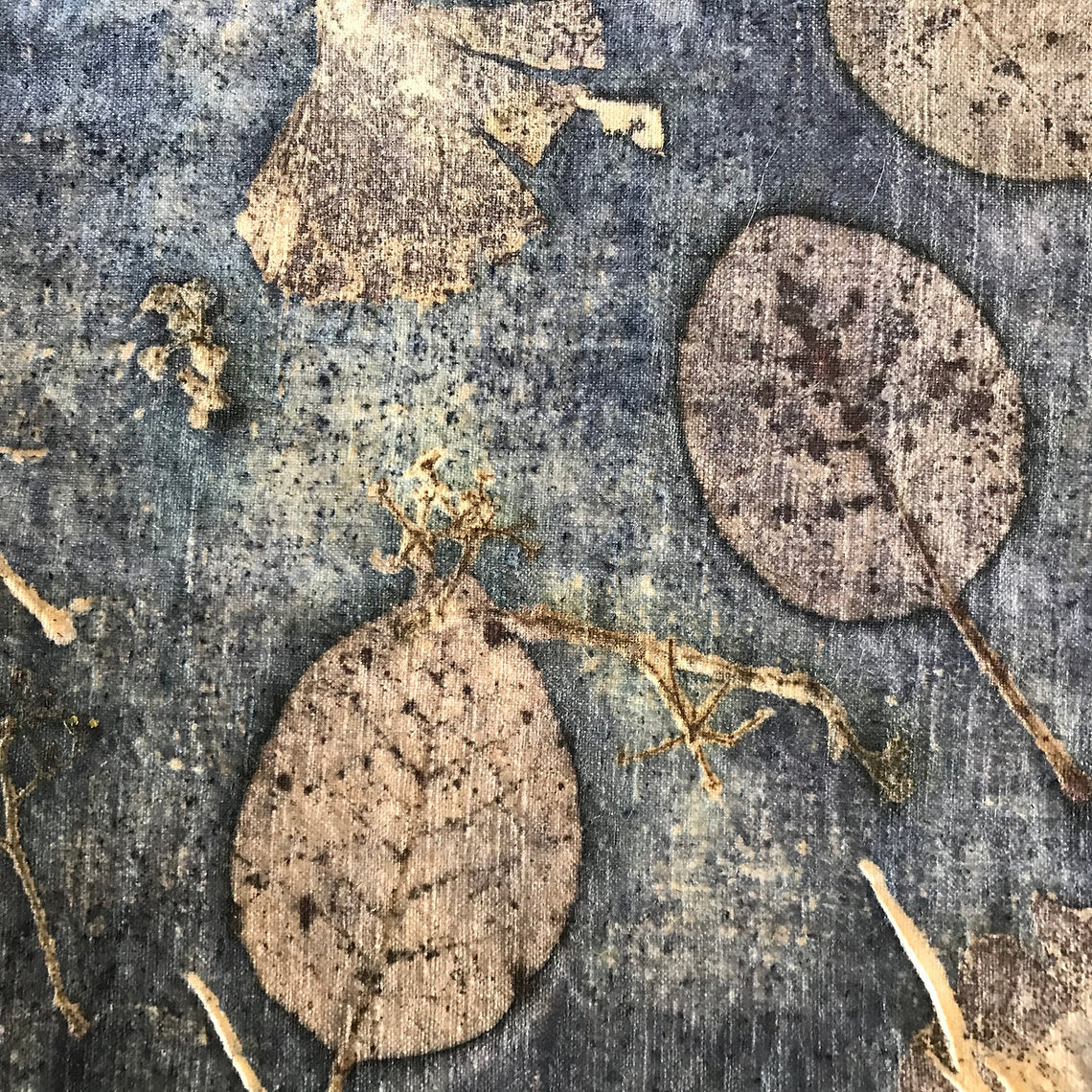 Textile with leaf pattern on a blue background