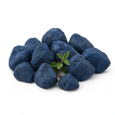 Blue stones with a green leaf on a white background