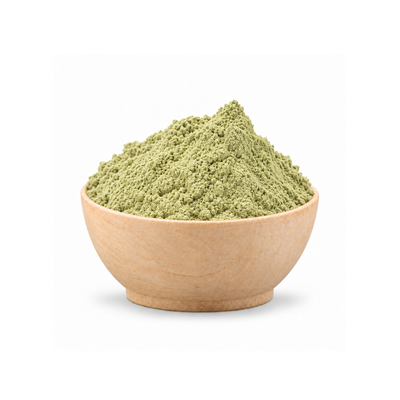 a mound of woad powder in a wooden bowl