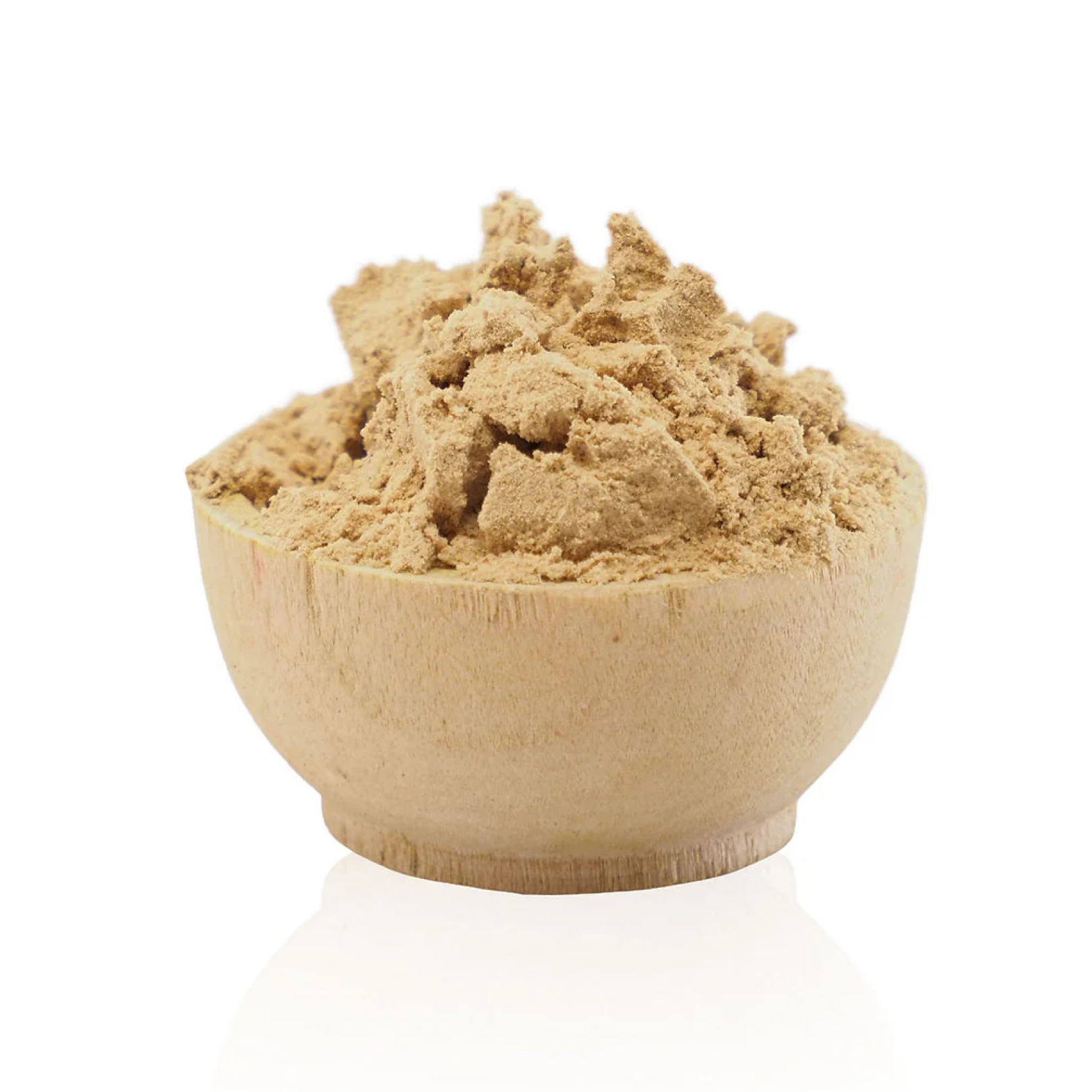 Wooden bowl filled with brown powder on a white background