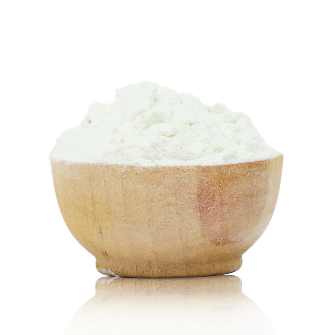 Wooden bowl filled with white rice on a white background
