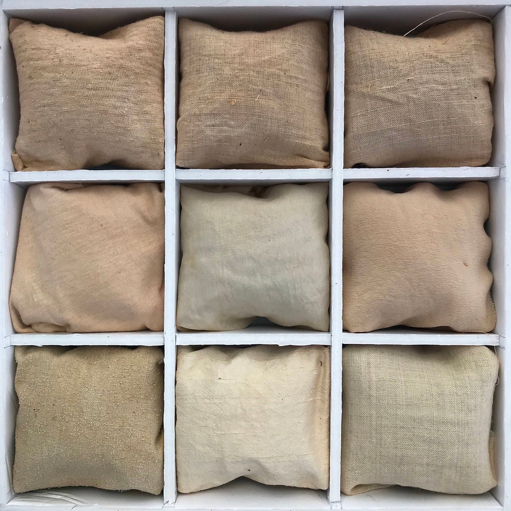 Nine beige fabric dyed Birch Bark (Betula pendula) arranged in a 3x3 grid on a white background