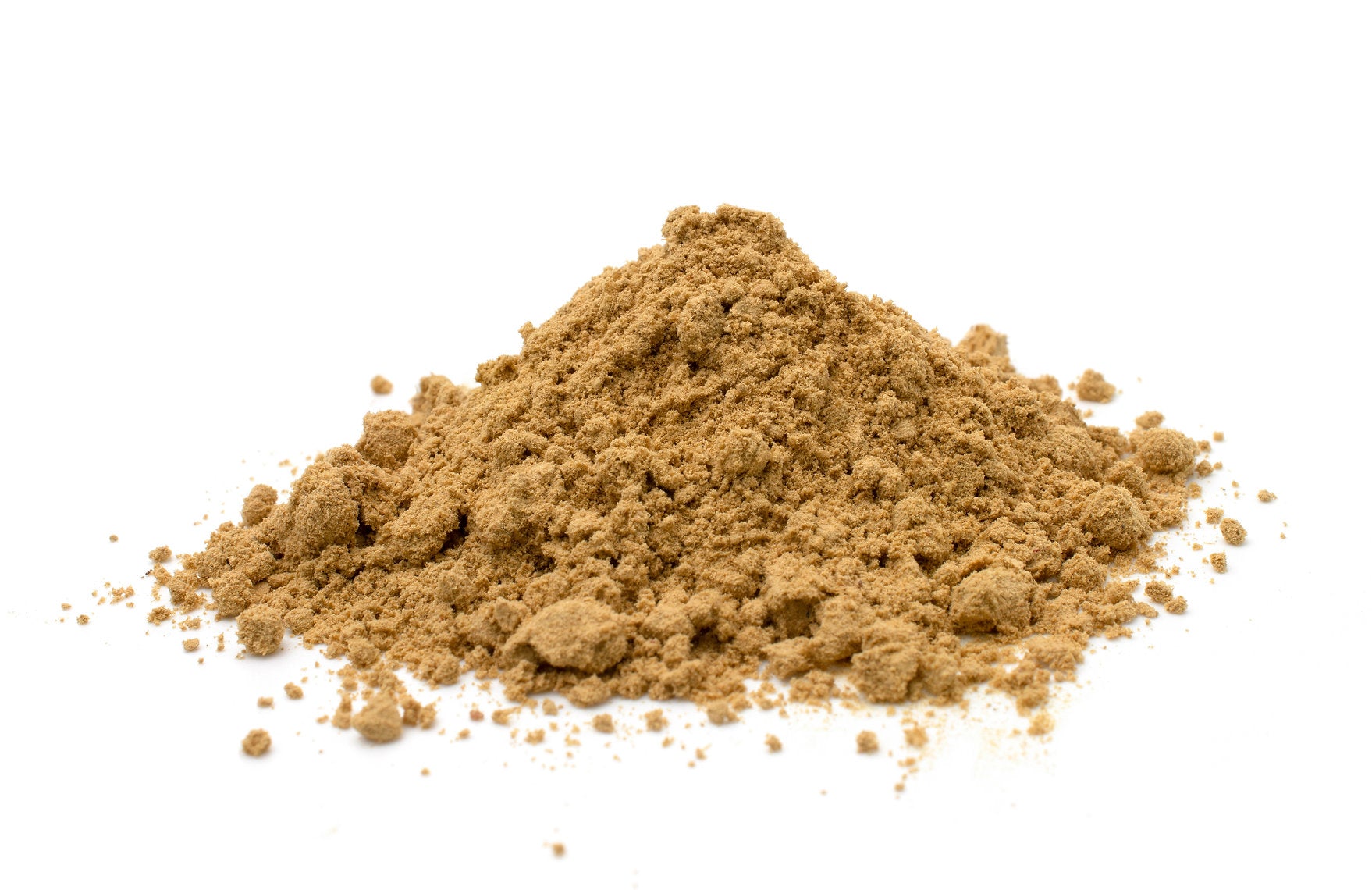 Pile of brown powder on a white background