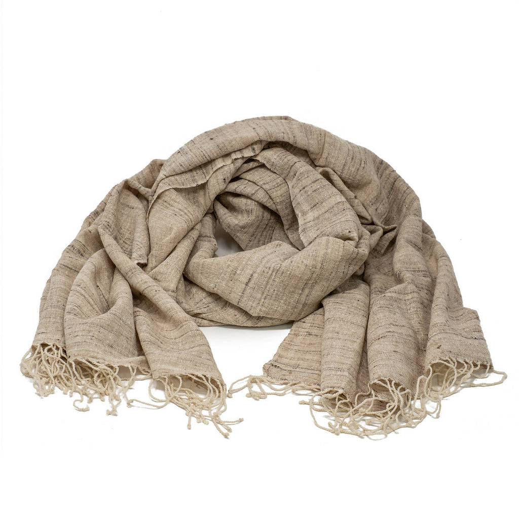 Beige silk scarf with fringes on a white background