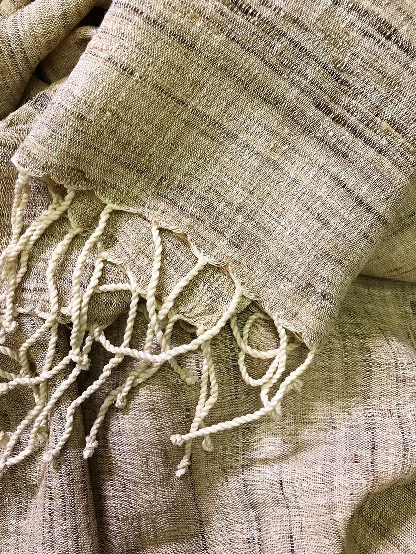 Textured silk scarf with fringes in a natural color palette