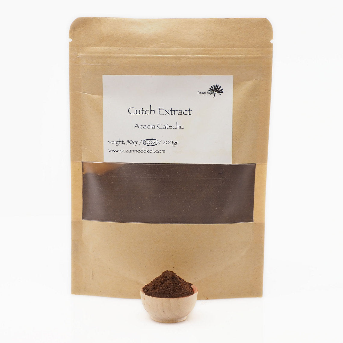 Kraft paper packaging of Cutch Extract with a small bowl of powder in front on a white background