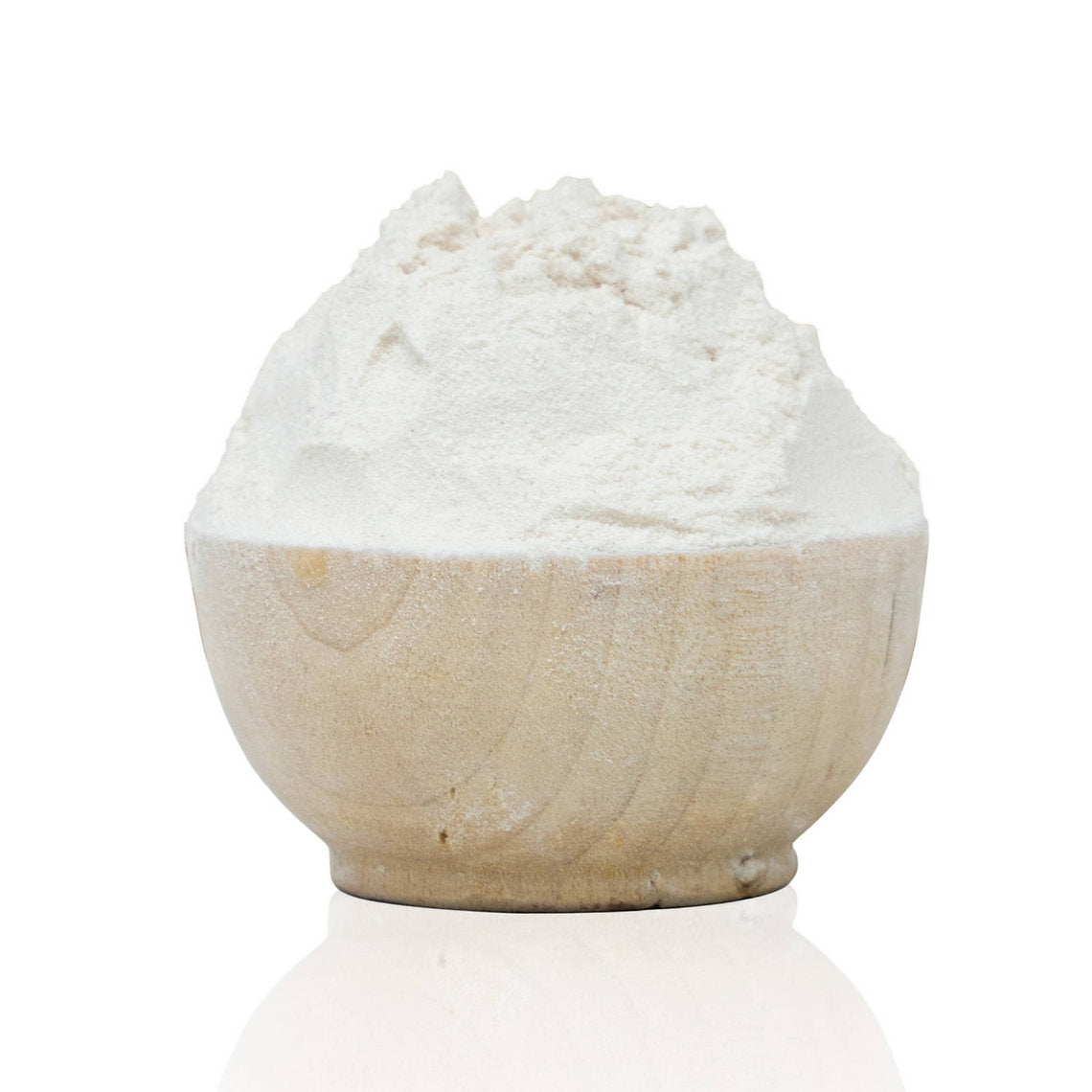 White Gum Arabic, natural thickener, organic powder in a stone bowl on a white background
