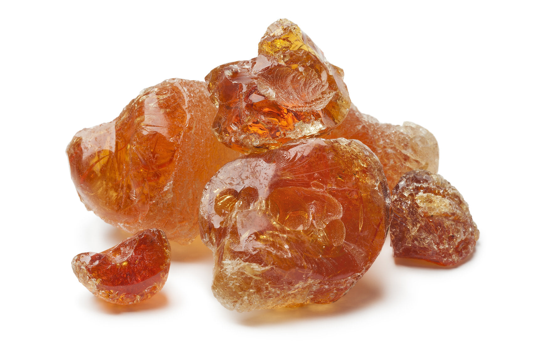Gum Arabic, natural thickener gemstones on a white background