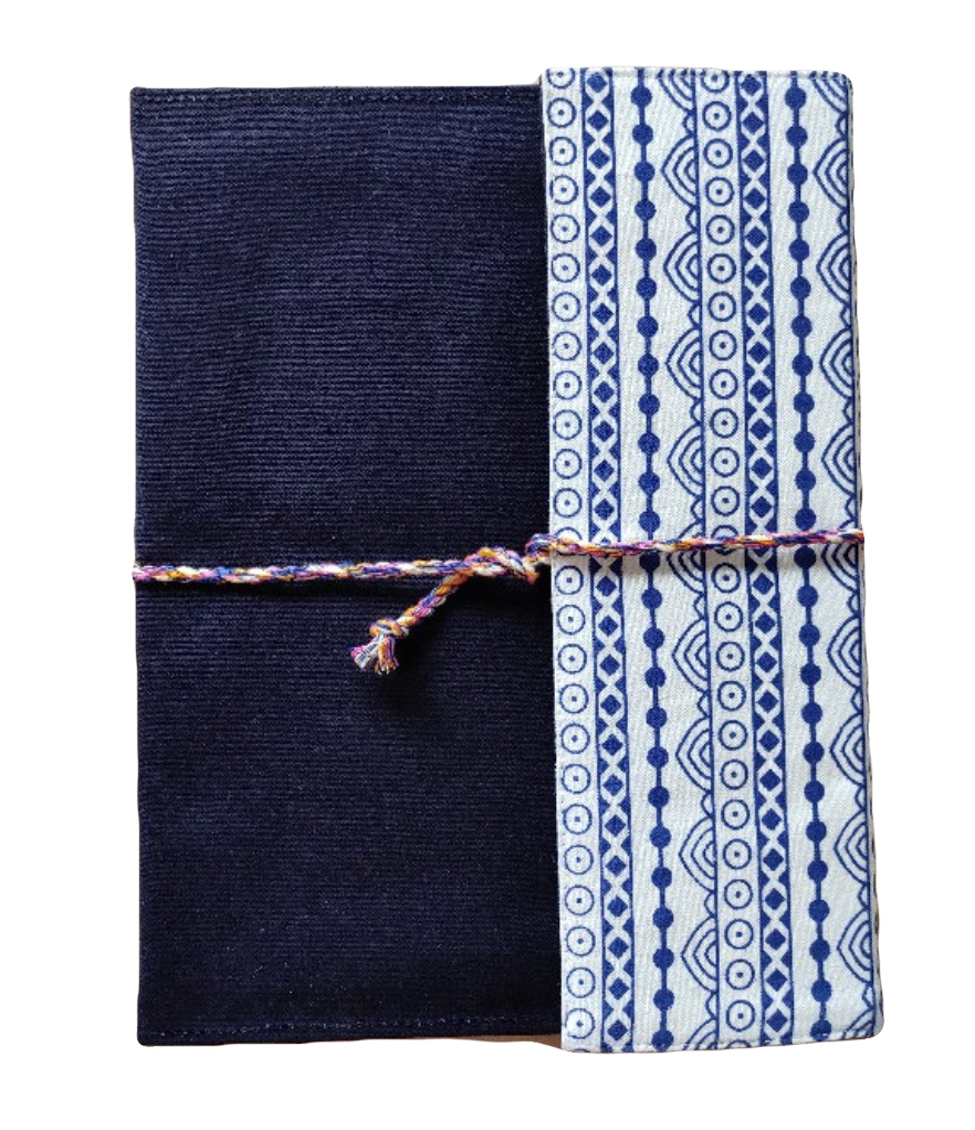 Navy blue fabric with a patterned blue and white strip tied around it on a white background