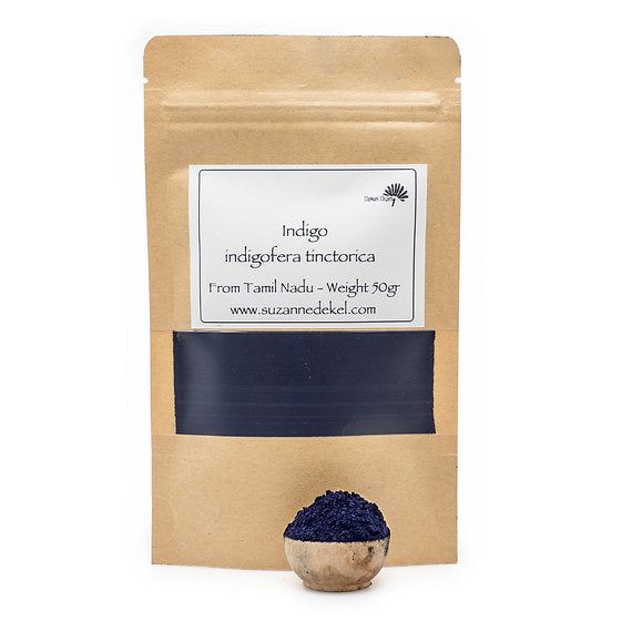 Kraft paper packaging with a label for indigo powder on a white background