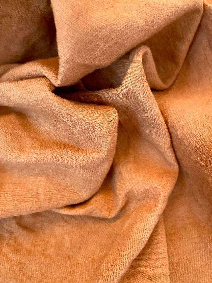 Close-up of brown fabric dyed Kakishibu - unripe persimmon tannin extract - Diospyros kaki