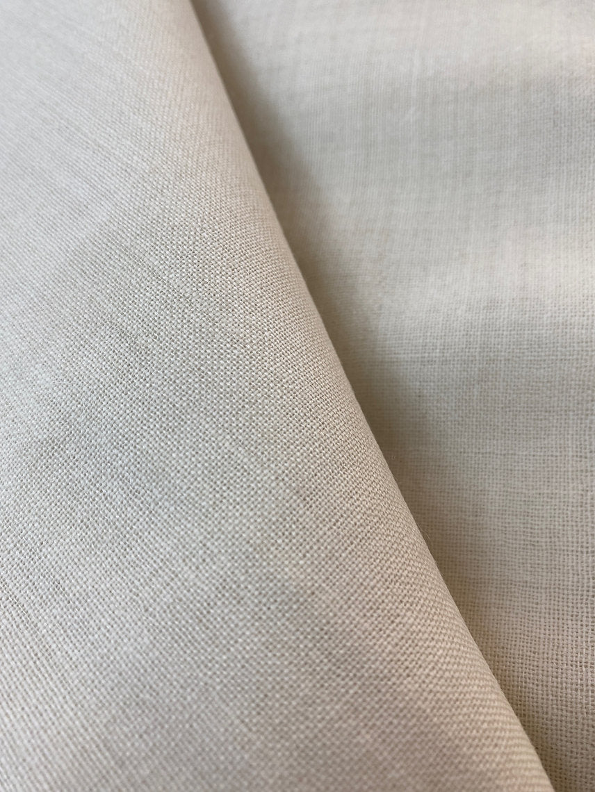 Close-up of beige fabric texture