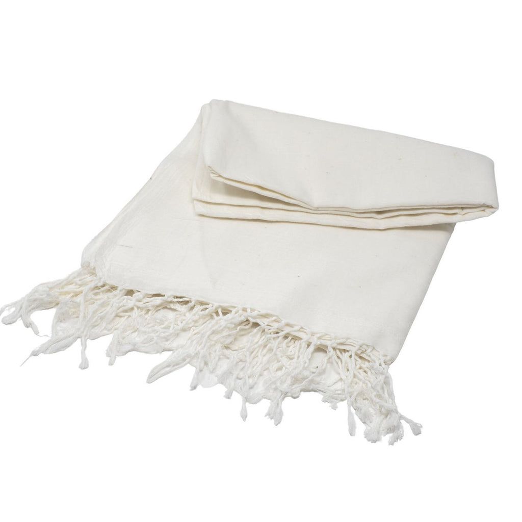 White shawl with fringes on a white background