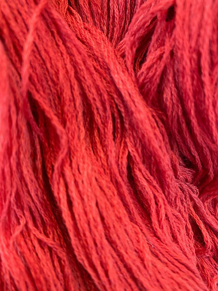 Close-up of bright red yarn strands