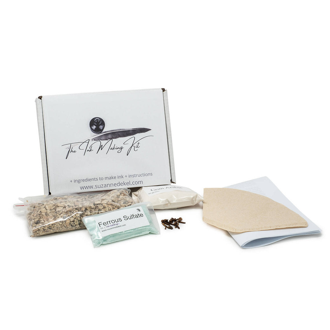Makeup Make Ink starter kit with various items including a box labeled 'The Veil Makeup Kit' on a white background.