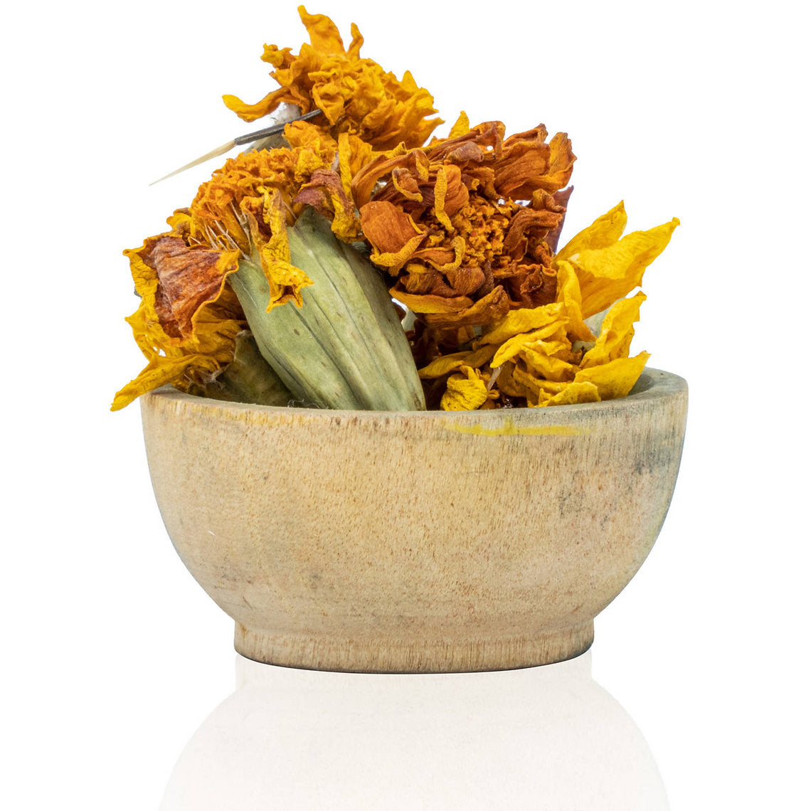 Wooden bowl with dried flowers on a white background
