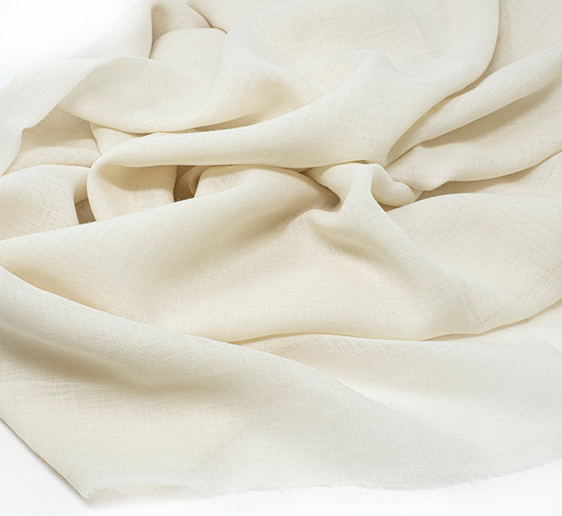 Close-up of beige fabric with soft texture