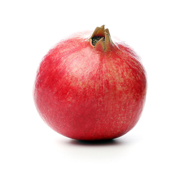 Red pomegranate on a white background