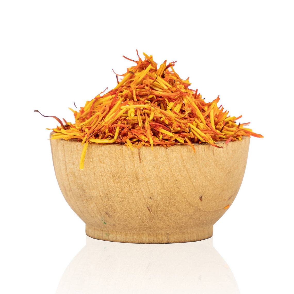 Wooden bowl filled with dried saffron strands on a white background