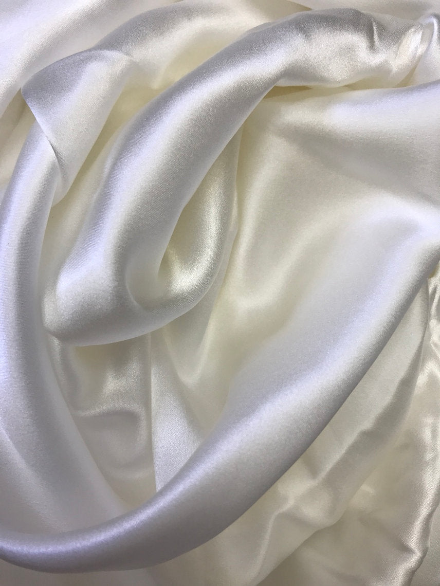 Close-up of smooth, white silk fabric