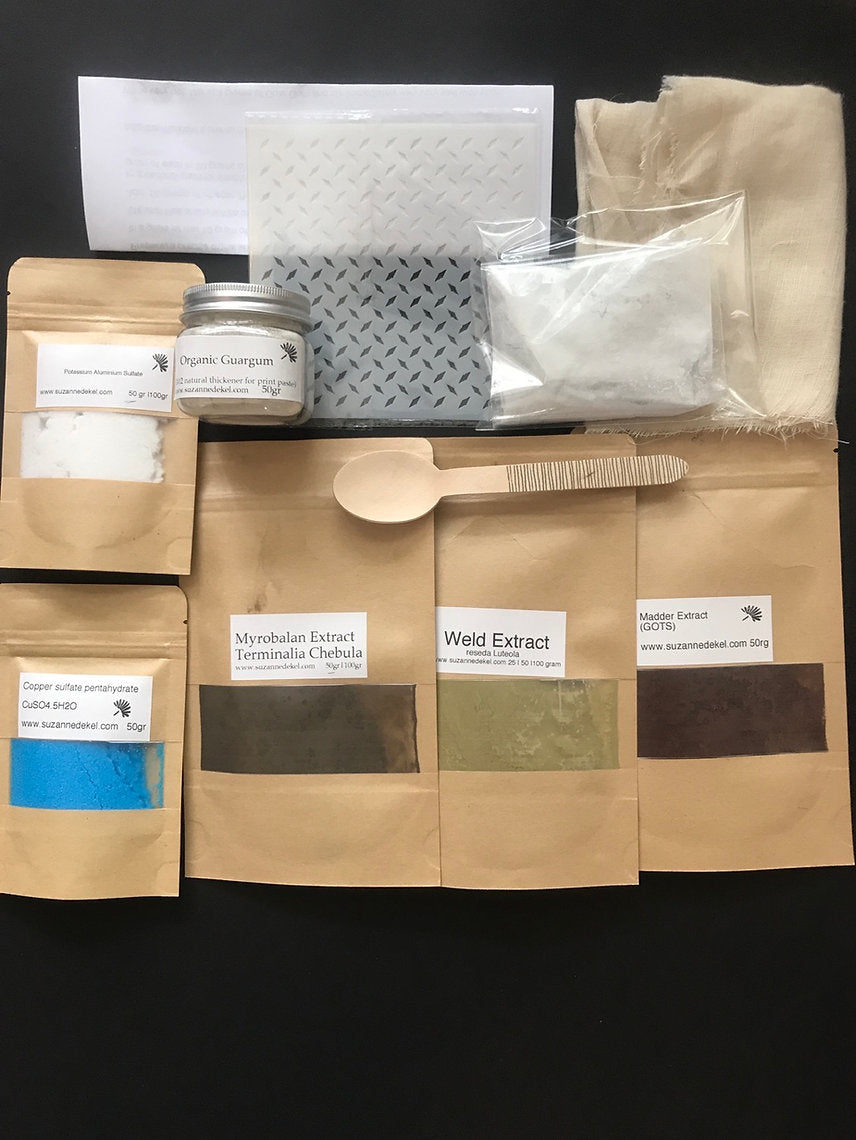Collection of herbal extracts and packaging on a black background