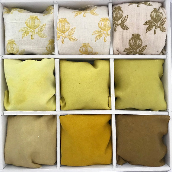 Nine fabric samples arranged in a grid with floral patterns on a white background