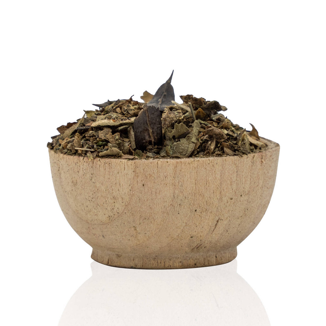 Bowl of dried Woad Leaves and Seeds (Isatis Tinctoria) (Organic) on a white background