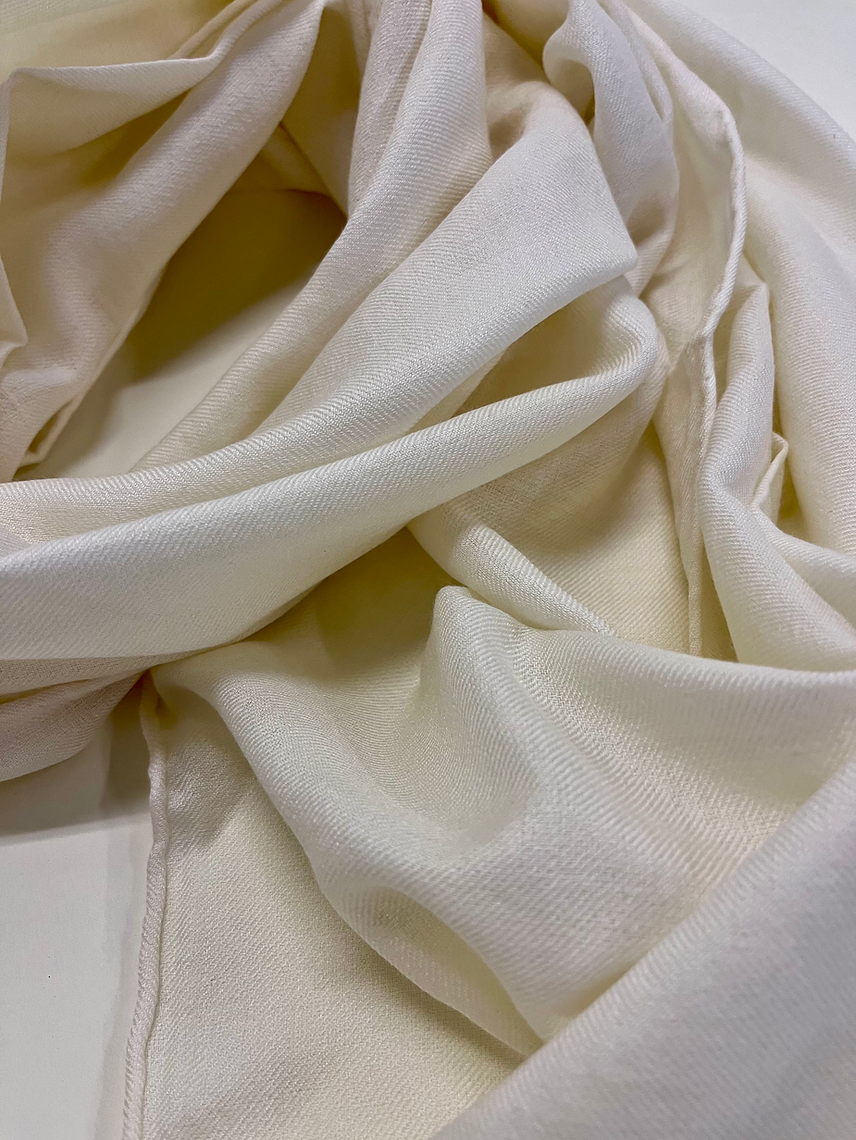 Close-up of beige fabric with a soft texture
