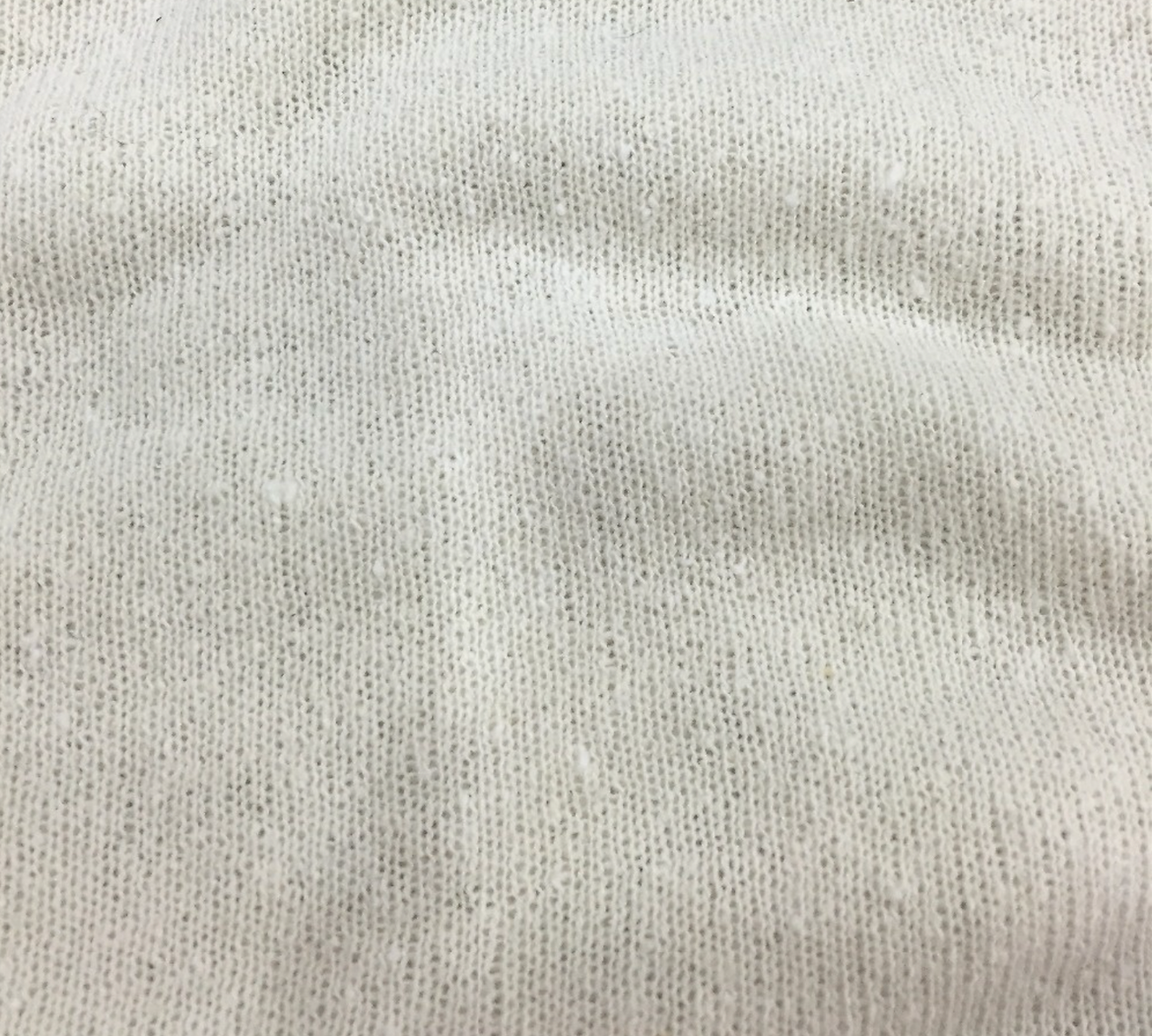 Close-up of beige fabric texture